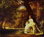 Lady Reading in a Wooded Park.
